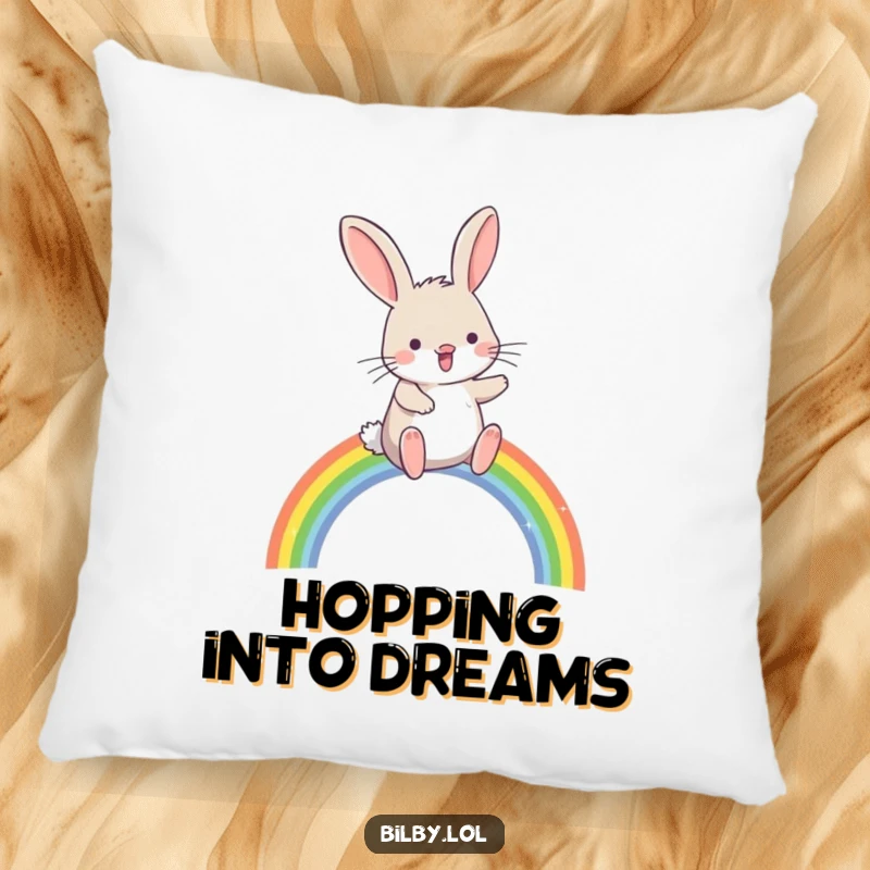 Funny bilby hopping joyfully over a small, sparkling rainbow arc on a soft pillow, offering comfort and humorous magical charm as a gift.