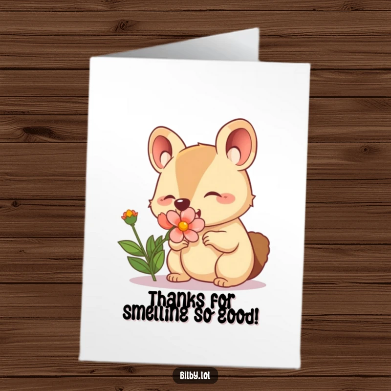 Funny Free Printable Thank You Card of an adorable marsupial happily sniffing a blooming flower with a twitching nose.